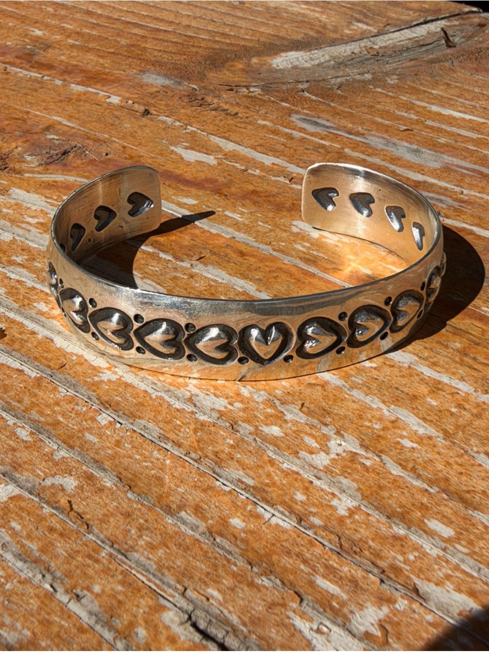 Native made cuff with hearts by artist Sunshine Reeves